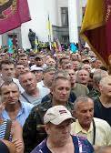 В противостоянии с митингующими под Радой пострадали восемь полицейских