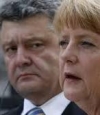 Порошенко согласовал с Меркель и Макроном шаги относительно встречи с Путиным
