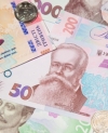 Нацбанк укрепил гривню до 26,76
